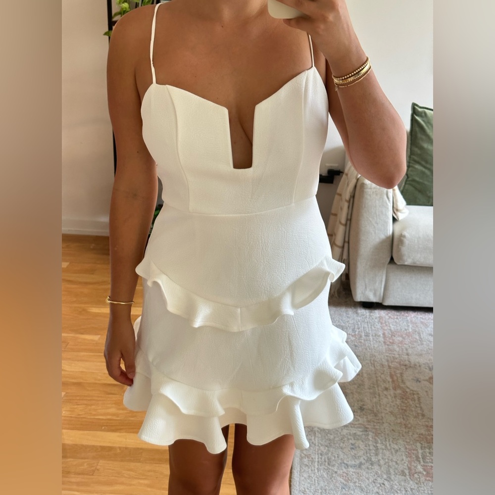White Ruffle Dress With Low Cut Front